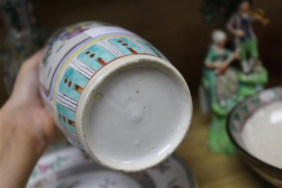 A Chinese crackle glaze bowl and jar, a pair of famille rose vases and two stone china plates
